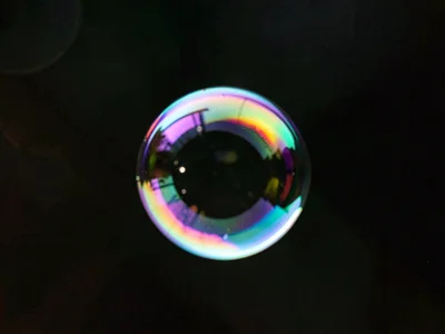 Single bubble against dark background