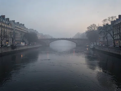 Bridge span visible only as suggestion in mist