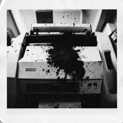 Toner spill on the copier glass captured as a scan, accidental inkblot test