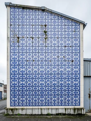 Industrial Relief Tiles — Machine-Pressed Oval Pattern on Warehouse