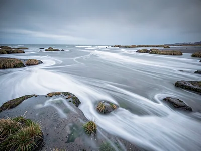 Tidal flat with water movement as soft white