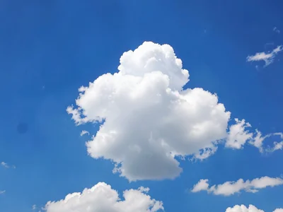 Single cloud in blue sky