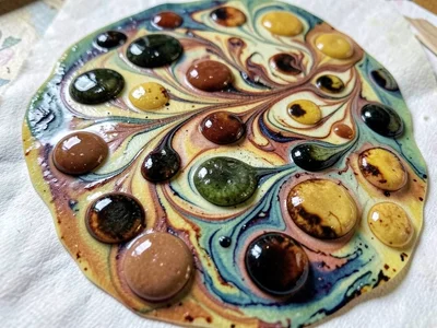 Battal ebru with heavy paint, thick opaque drops sitting proud on the surface cr