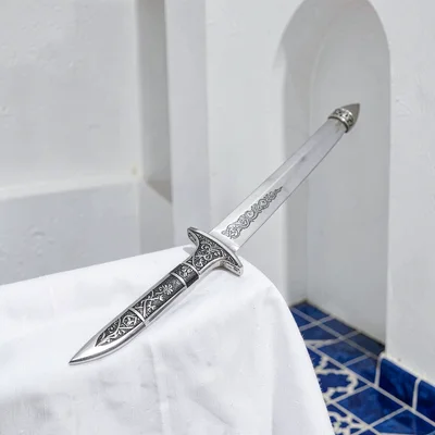 Extreme minimalist restraint of Muscat, Oman, traditional khanjar dagger on whit
