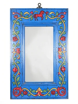 Traditional folk-painted mirror frame — blue wood with kurbits vine and leaf sur