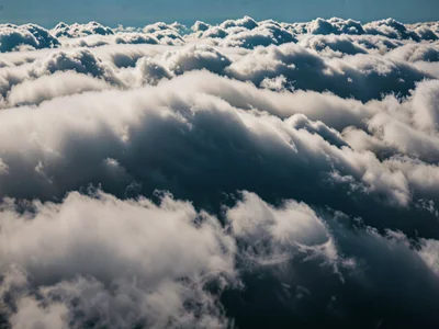 Cloud shadow cast on lower cloud layer creating negative light