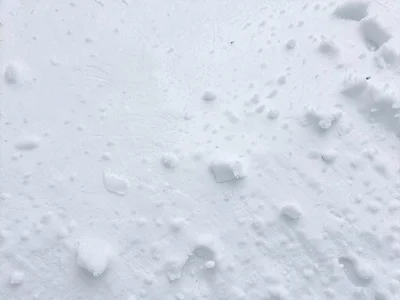 Snow crystal visible on surface closeup