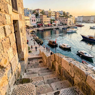 Old Jaffa time-layered, ancient port stone warmth, Sea-weathered stone stairs de