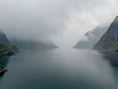 Fjord turn disappearing into continuous gray