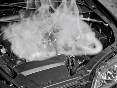 Heat distortion above car engine hood