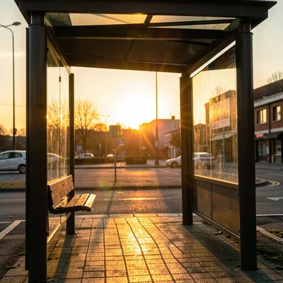 A bus stop shelter during the last moments of golden hour