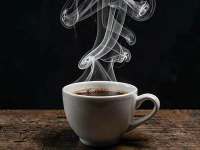 Heat rising from coffee cup showing turbulent plume structure