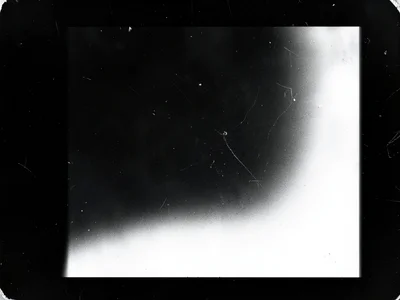 A print with deliberate light fogging: a smooth gradient of exposure from one ed