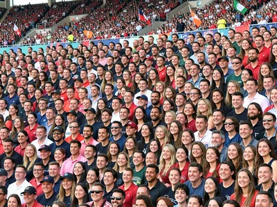 Stadium crowd as wall of faces