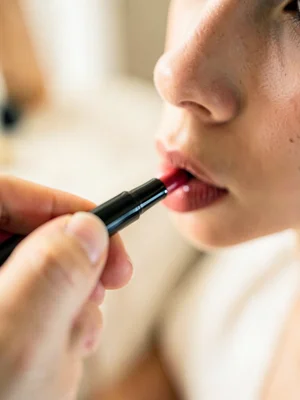 Lipstick being applied close