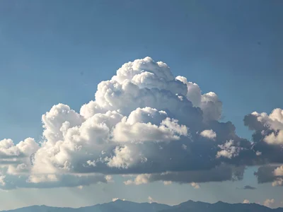 Cloud bank with hard edge against crystal clear atmosphere