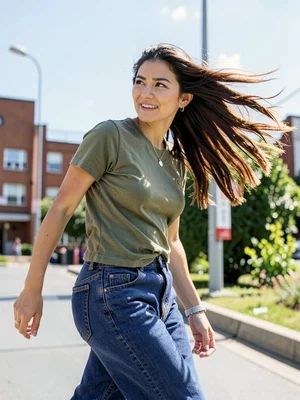 Woman turning suddenly when someone calls her name, hair still catching up