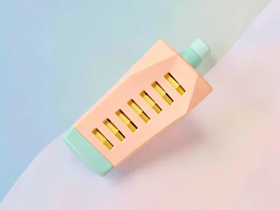 Bluesy peach lowpoly harmonica with chunky butter-yellow vent slots and mint sid