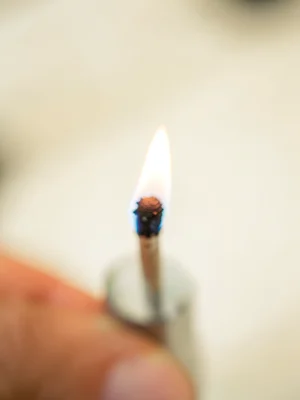 Match flame igniting