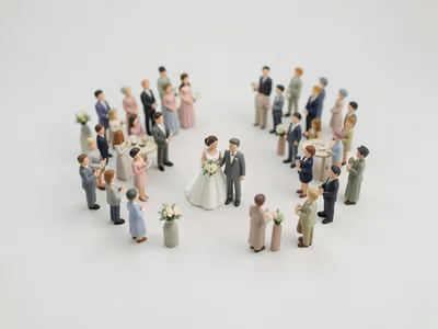 Wedding ceremony from drone above, tilt-shift, toy-like guests and couple