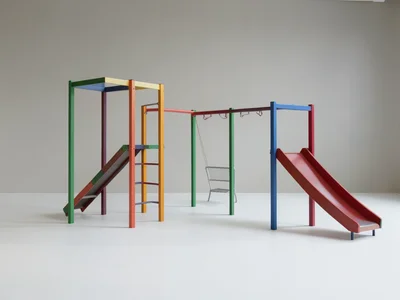 Playground in Bauhaus style, equipment as primary colored geometric construction