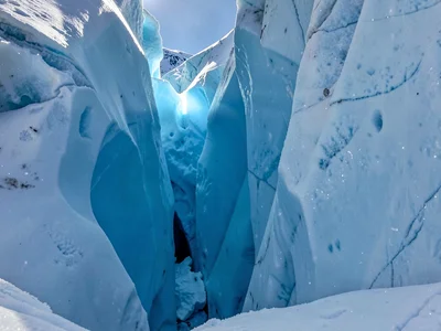 Light filtering through ice showing blue