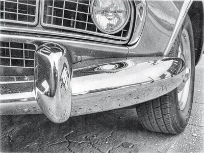 Chrome car bumper with reflections