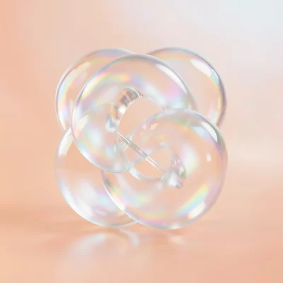A torus knot in frosted glass with visible internal refractions, on a warm peach