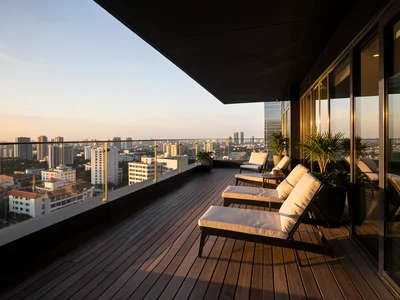 Rooftop terrace of an office building with wooden decking, lounge furniture, cit