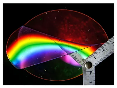 Ruler bent showing stress rainbow through polarizers