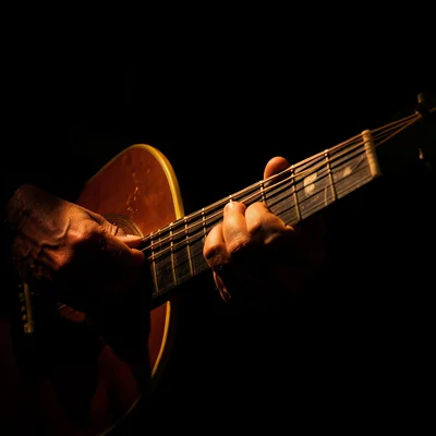 A guitar player's hands forming a chord, harsh spotlight creating deep shadows b