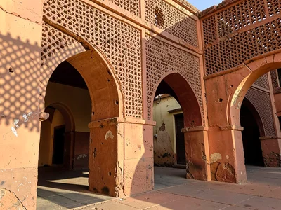 Afternoon sun through mashrabiya lattice in Lamu, Kenya, Multiple archways reced
