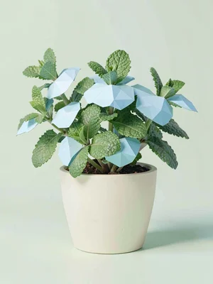 Kitchen sky-blue lowpoly potted herb with chunky mint leaves and a cream pot, on