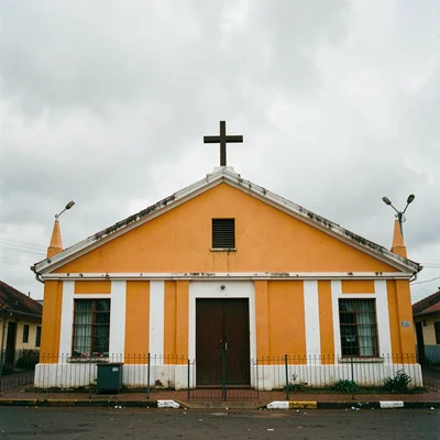 Overcast flat light in Accra, Ghana turning surfaces into pure color fields, Chu