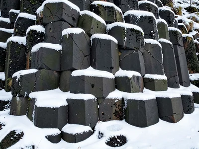 Frost on basalt columns adding white accent