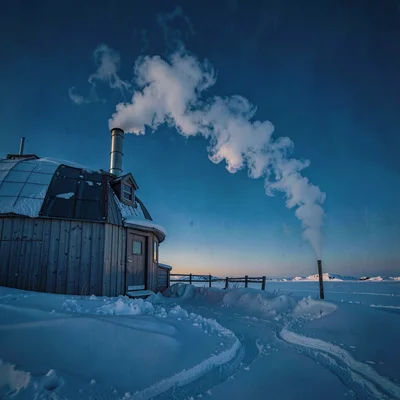 Photograph with Alaskan Arctic sensibility, Steam rising from a building vent ag
