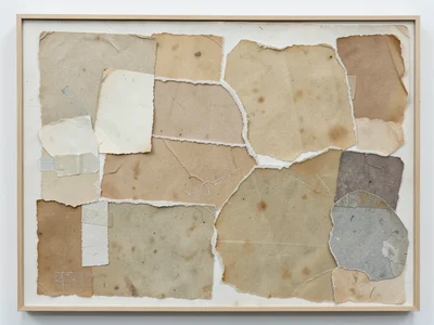 Torn Japanese washi papers in muted earth tones, fibrous torn edges creating sof