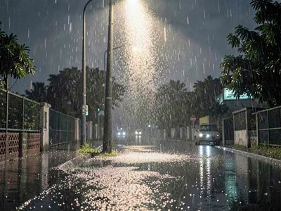 Streetlight illuminating rain column