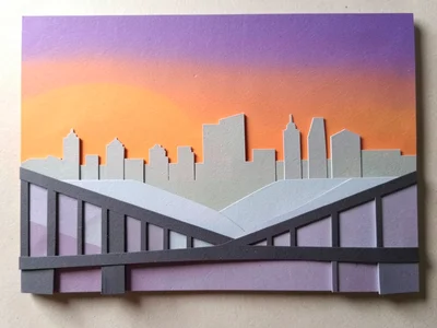 A city skyline at sunset: gradient sky from orange to purple as back layers, bui