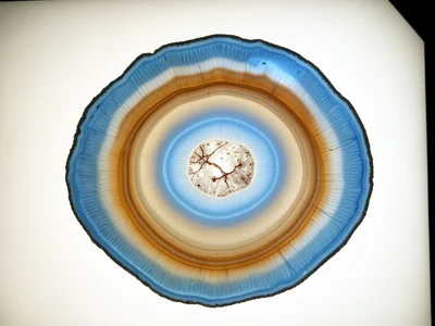 Geode with blue chalcedony lining, smooth icy blue interior surface with subtle 
