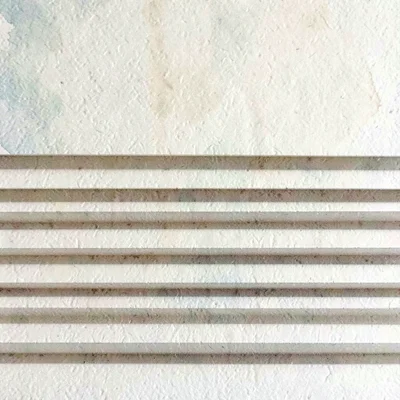 A series of horizontal paper-folds creates rhythmic creases across the lower-hal