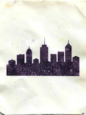 A cityscape skyline printed on receipt paper, buildings as blocky thermal printe