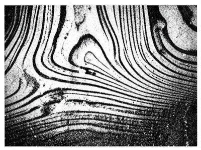 Photocopy of wood grain, the pattern exaggerated and simplified through toner re