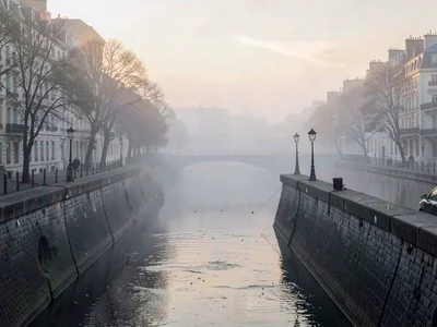 Stone quay wall receding into fog layers