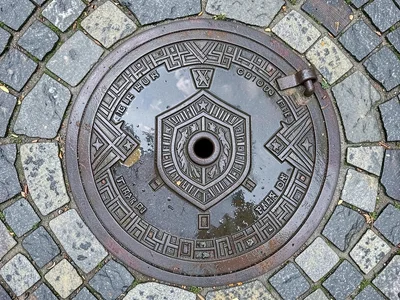 Utility Hatch Flush with Cobblestone Surround