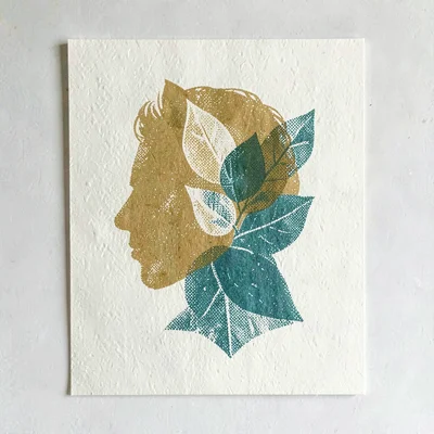 Riso style window-decal design of a card silhouette with halftone leaves in must