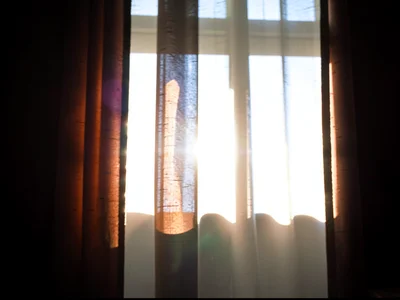 Curtain with window light behind