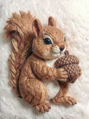 Squirrel holding acorn
