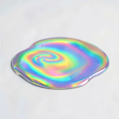 Iridescent oil-slick puddle hero centered with rainbow swirls and soft surface t