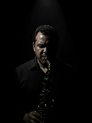 Jazz musician in single spotlight